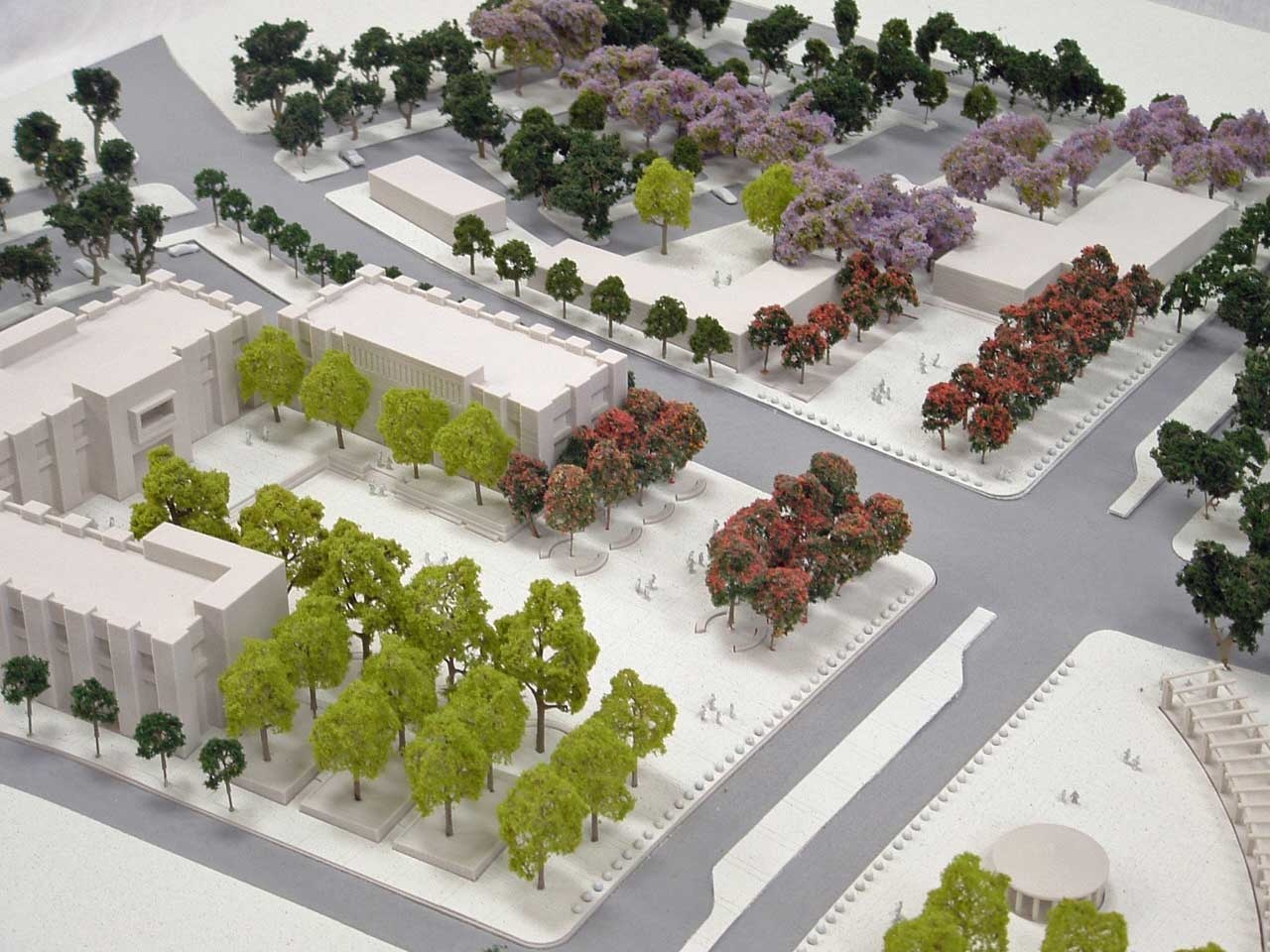 Monochrome 3D Printed Buildings with Colored Base and Trees