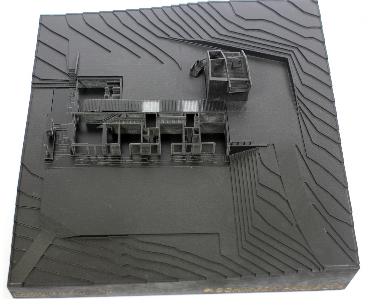 3d printed stepped contour model in black and clear plastic
