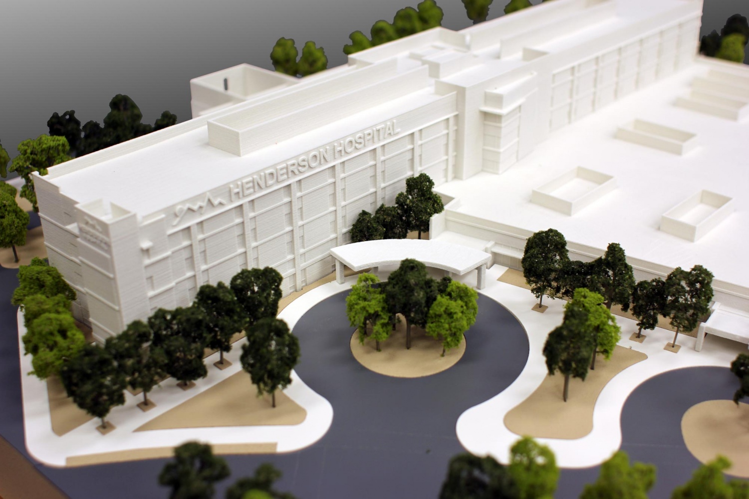 larger scale 3d print of the Henderson Hospital set in to a CNC machined base
